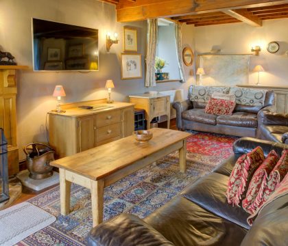 Shepherds Cottage, Hawes - Herdwick Cottages - Living room with log-burning stove